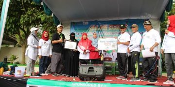 Dua Orang Peserta Jalan Sehat Kerukunan Raih Doorprize Umrah